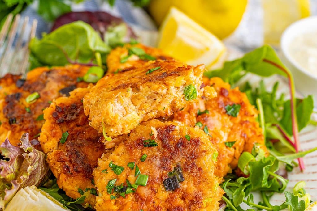 close up of a salmon cake broken in half