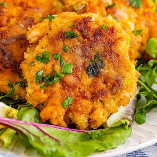 salmon cakes on a white serving plate