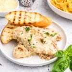 angled shot of creamy chicken on a plate