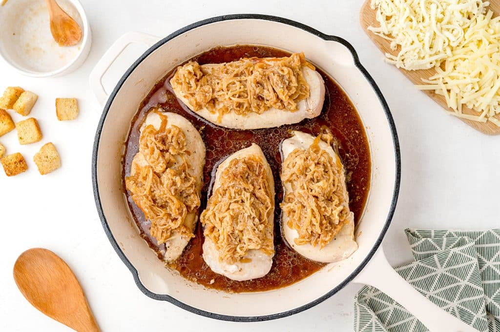 baked chicken topped with caramelized onions