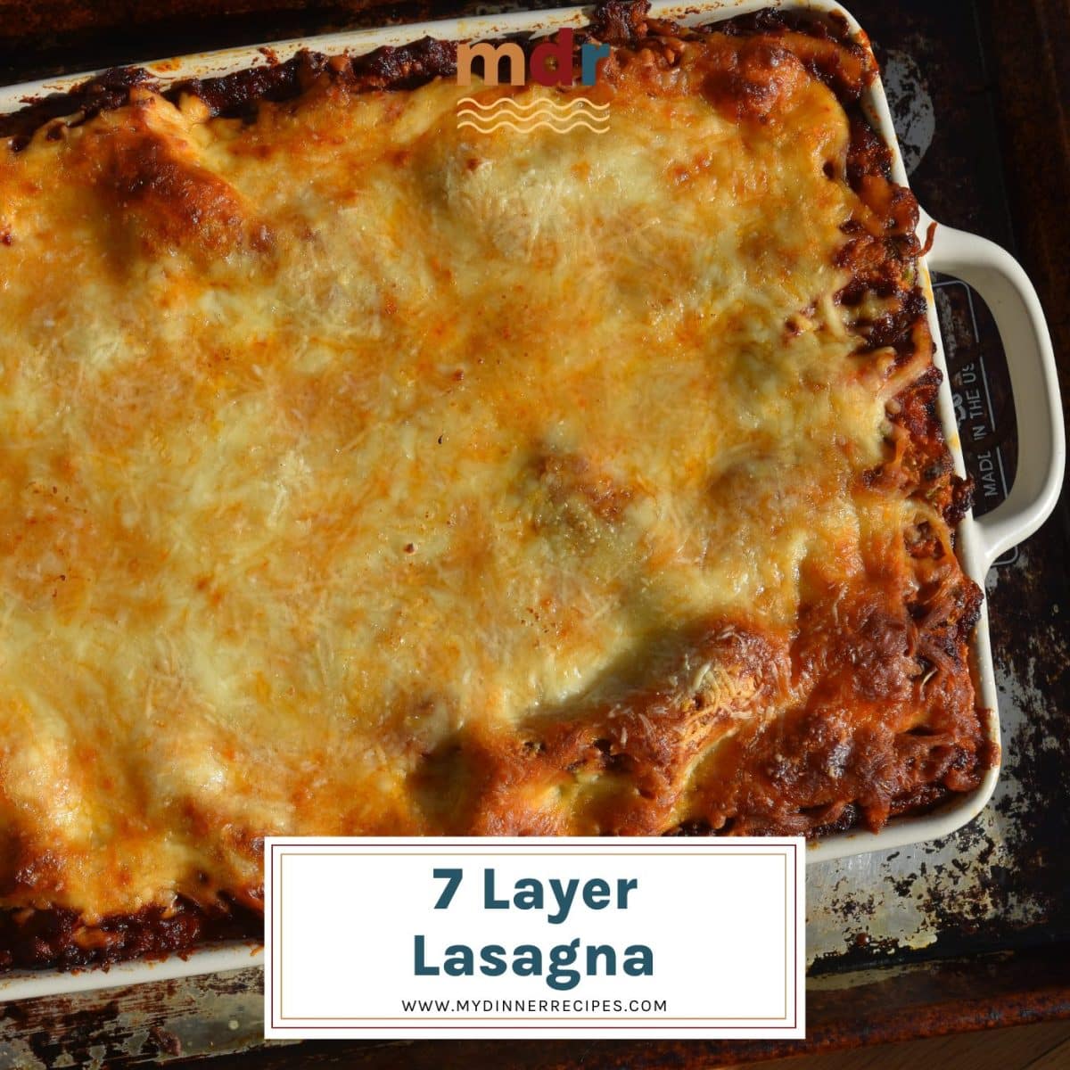 7 layer lasagna on baking sheet fresh from the oven