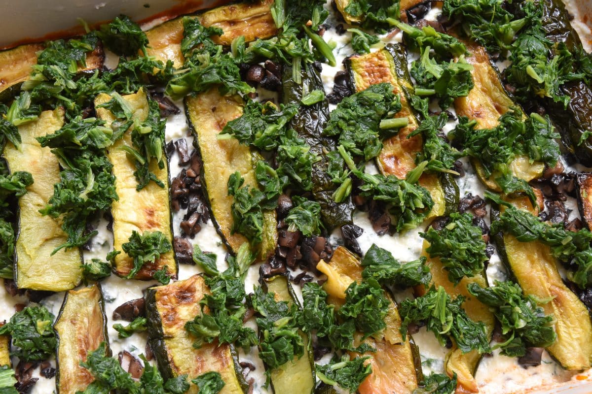 Ricotta cheese mixture topped with roasted portobello mushrooms, roasted zucchini, and cooked spinach.