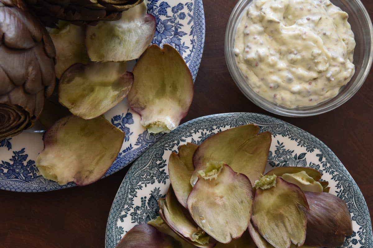 Steamed artichoke leaves and zesty caper dipping sauce. 